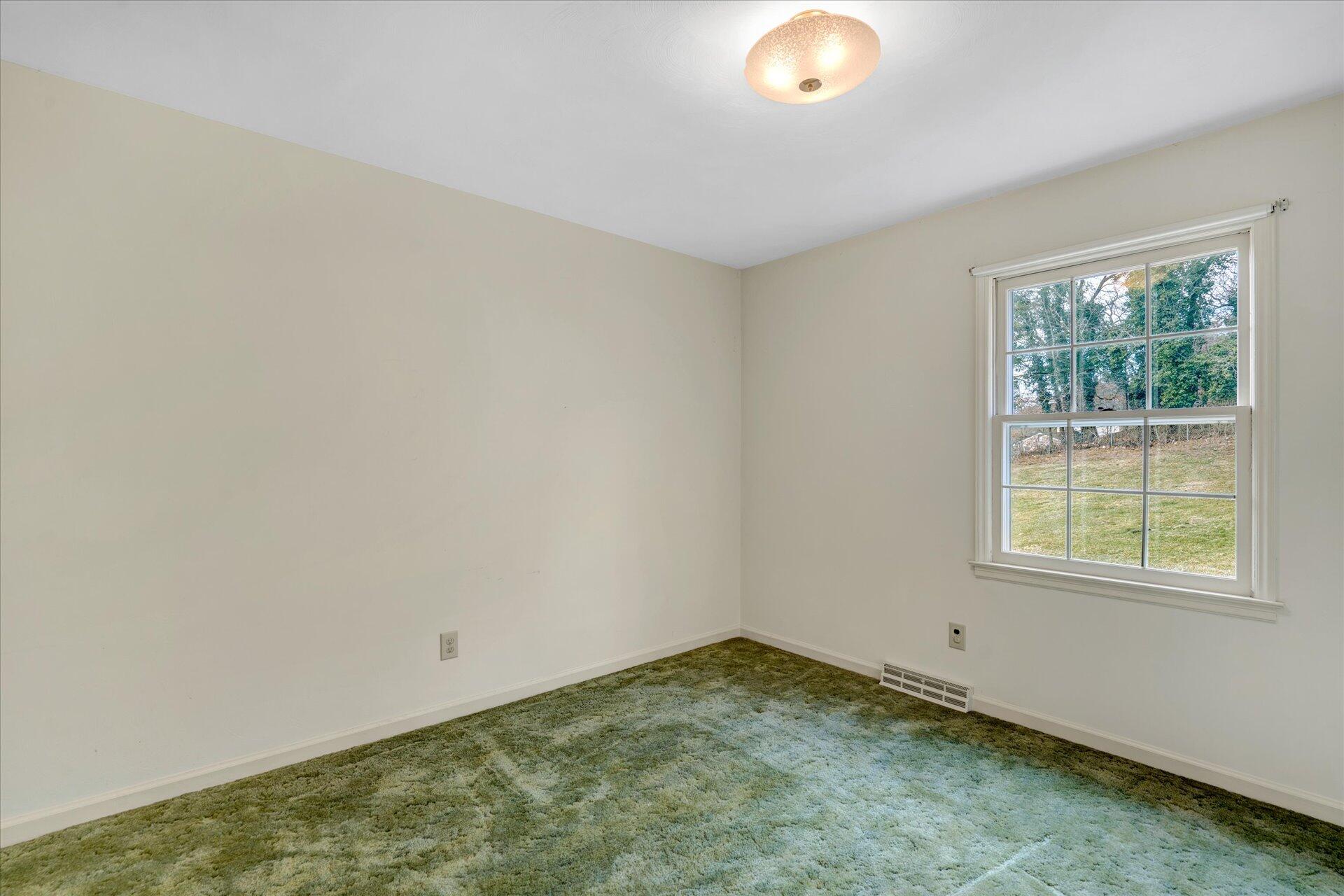 306 Ridgeview Road Blue Ridge, VA 24064 - Photo 17 of 30 an empty room with a window