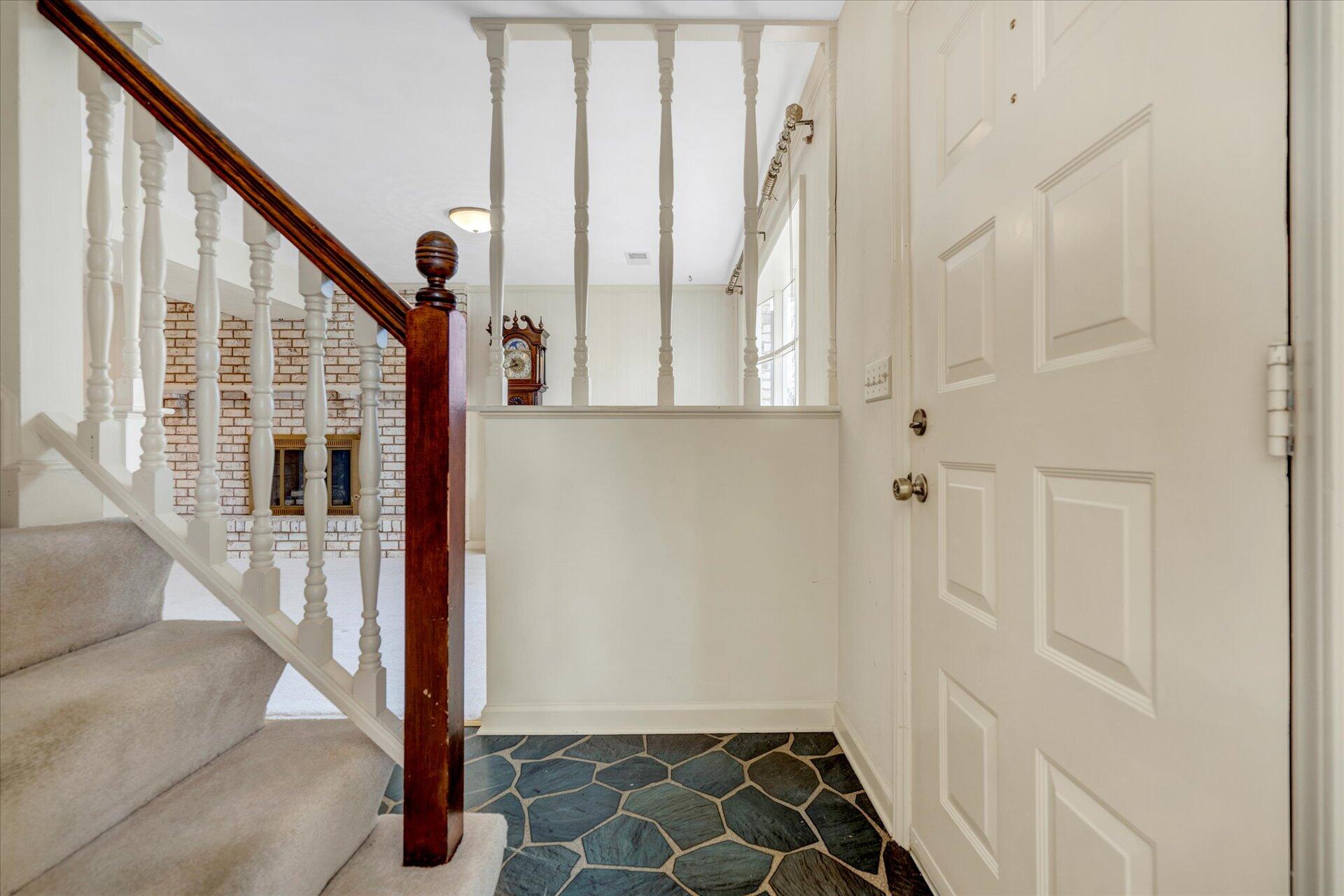 306 Ridgeview Road Blue Ridge, VA 24064 - Photo 3 of 30 a view of a hallway with wooden floor and staircase