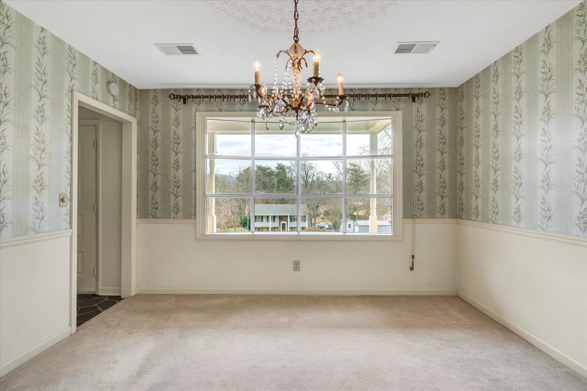 306 Ridgeview Road Blue Ridge, VA 24064 - Photo 8 of 30 a view of an empty room with window