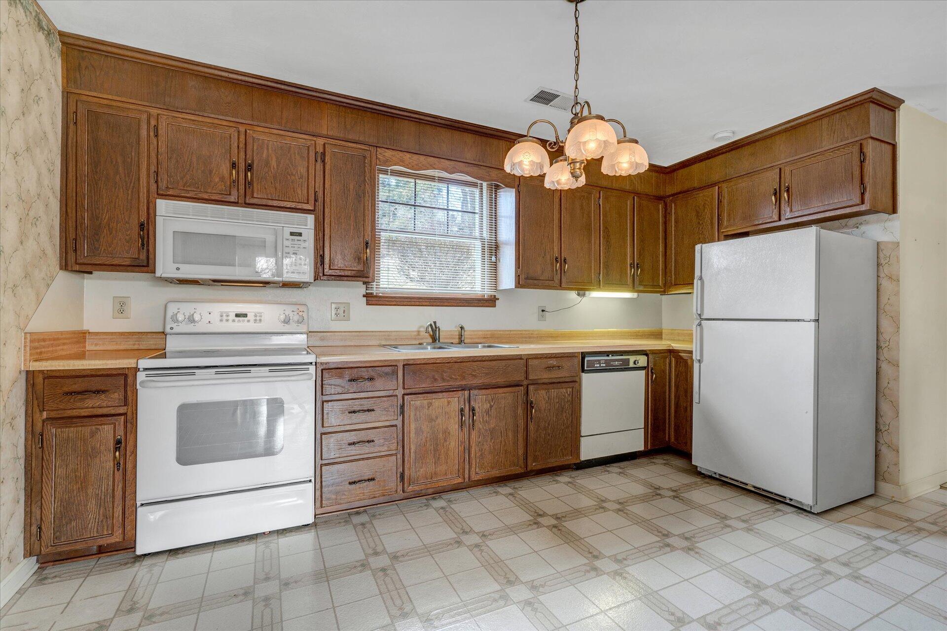 306 Ridgeview Road Blue Ridge, VA 24064 - Photo 9 of 30 a kitchen with appliances cabinets and a sink