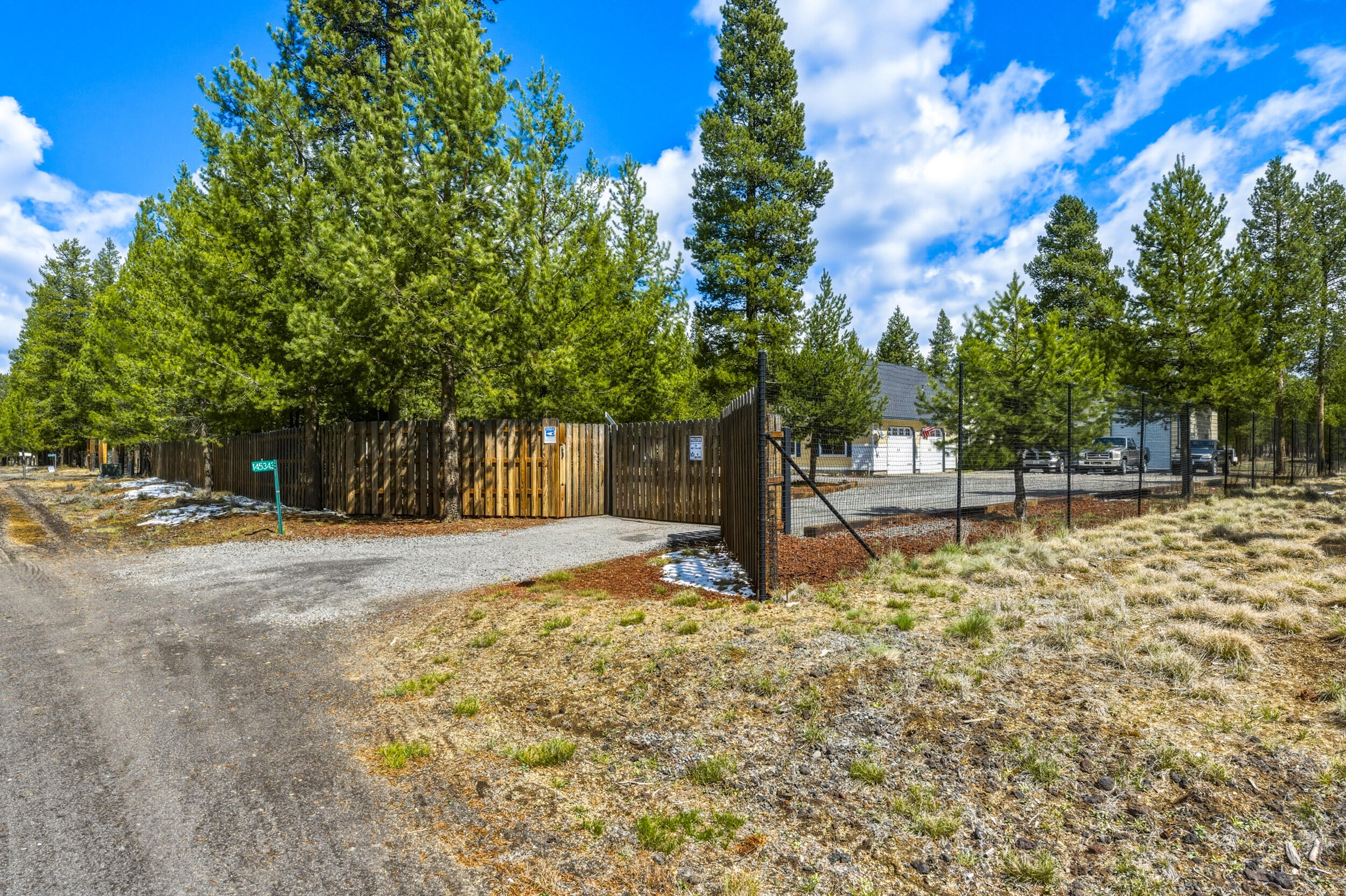 145343 Birchwood Road La Pine, OR 97739 - Photo 3 of 59 Front Entrance- Fully Fenced and Gated with Electric Remote Controlled Entry