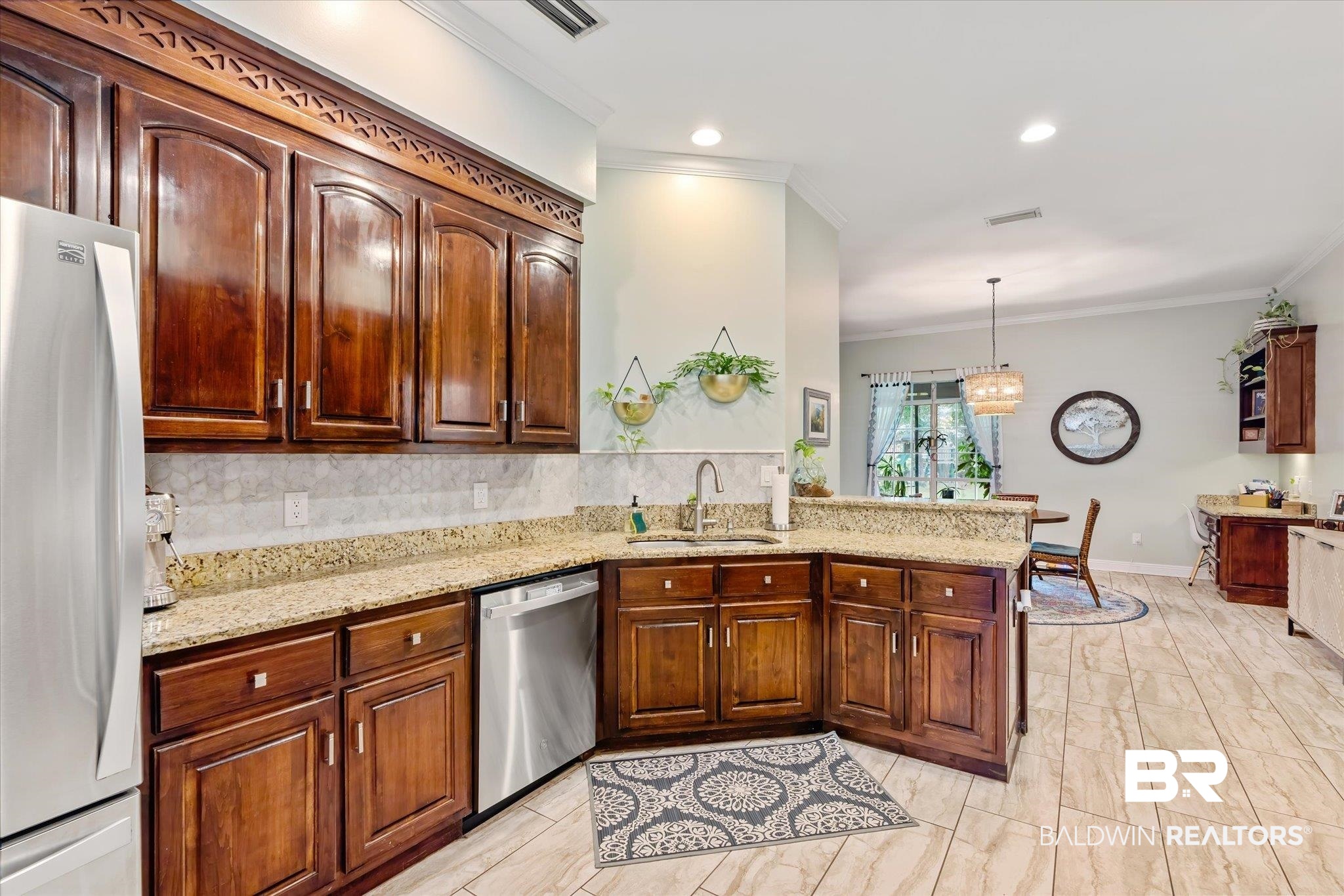3600 Russells Lane Mobile, AL 36619 - Photo 7 of 43 Kitchen featuring dishwasher, white refrigerator, sink, kitchen peninsula, and pendant lighting