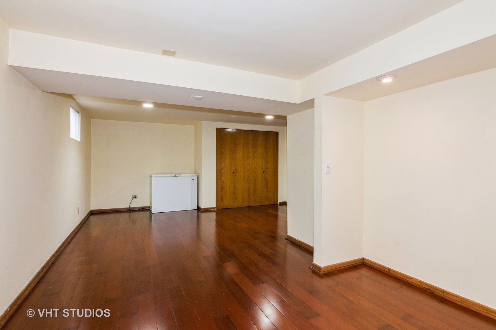 1295 Chatsworth Lane Hoffman Estates, IL 60169 - Photo 19 of 24 a view of an empty room with wooden floor and closet