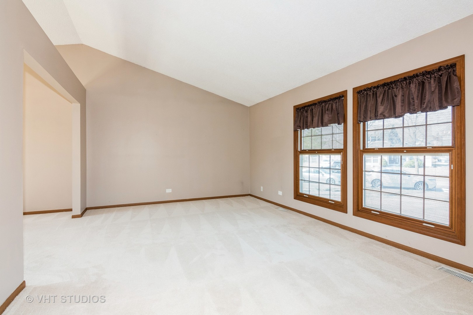 1295 Chatsworth Lane Hoffman Estates, IL 60169 - Photo 3 of 24 a view of an empty room with a window