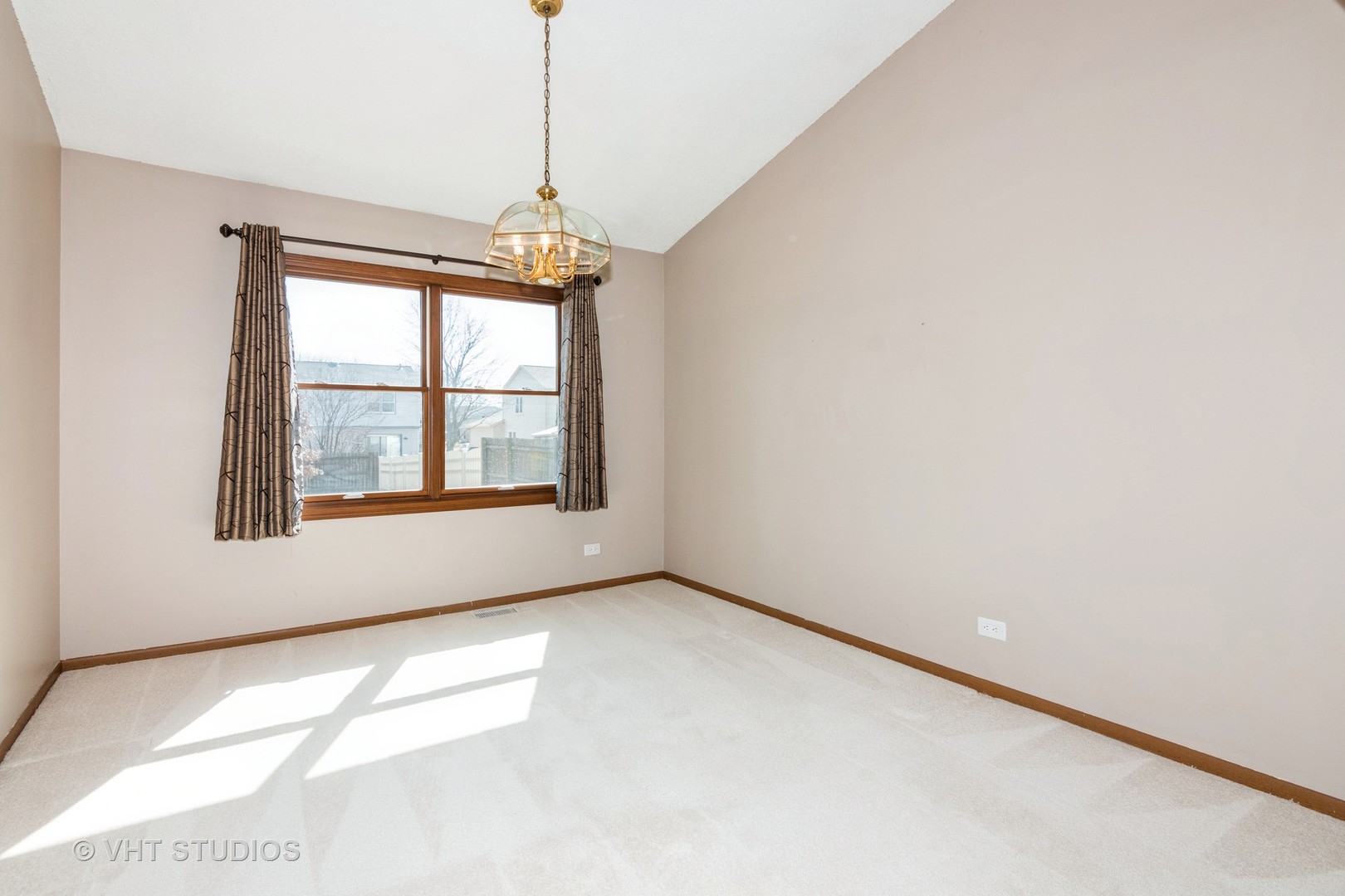 1295 Chatsworth Lane Hoffman Estates, IL 60169 - Photo 5 of 24 a view of an empty room with a window