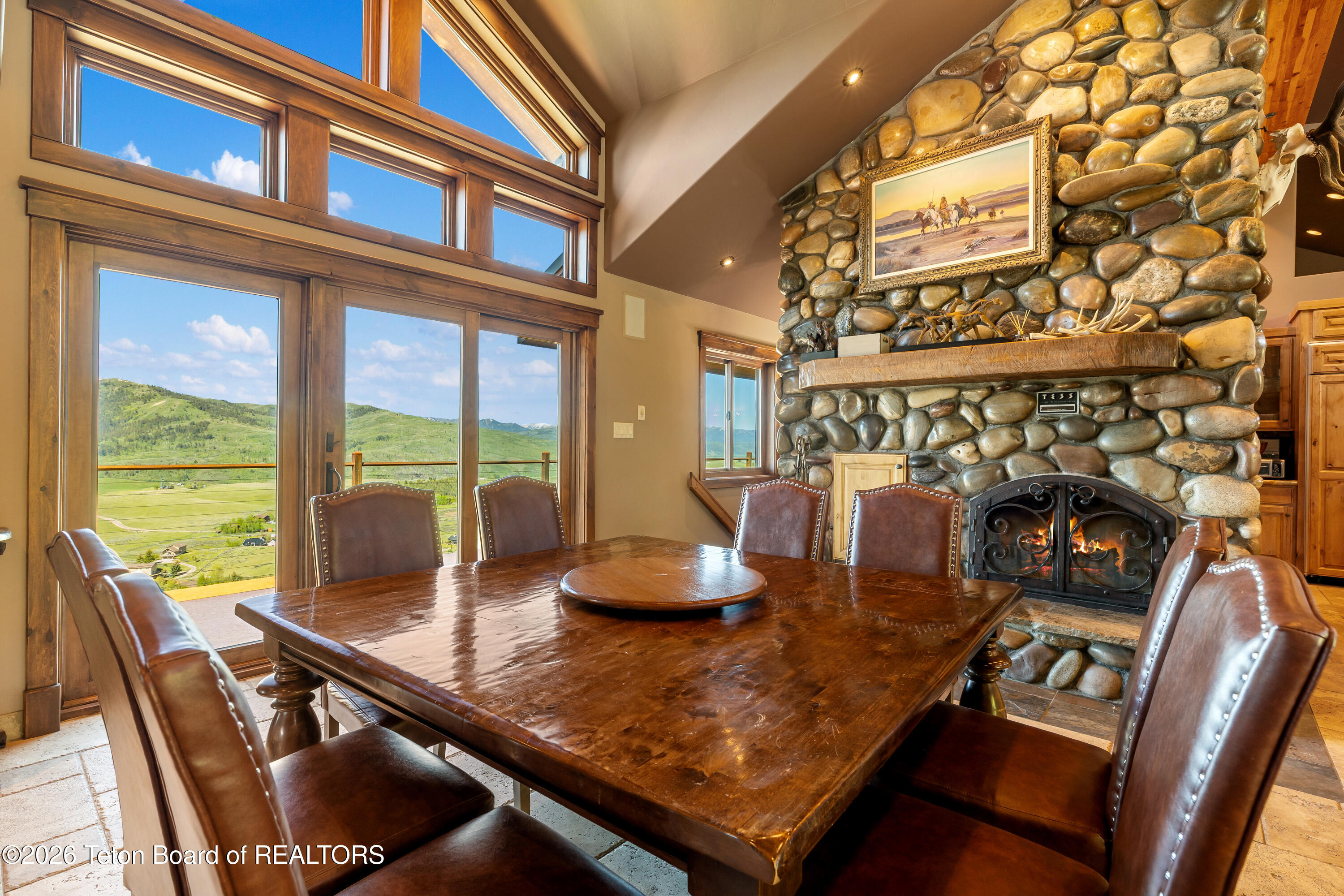 2490 La Bonte Road Jackson, WY 83001 - Photo 6 of 50 Dining Table Fireplace