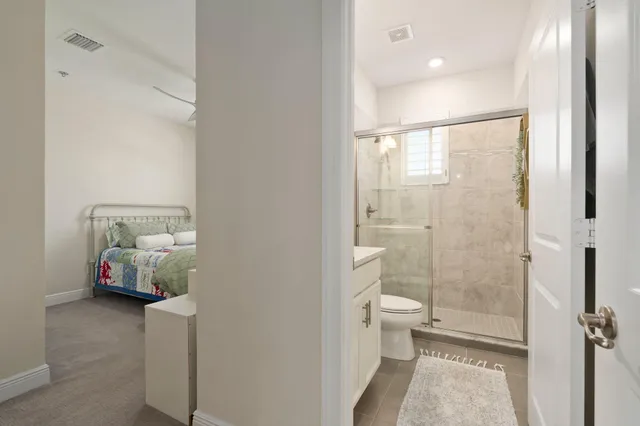 a view of a balcony with chairs