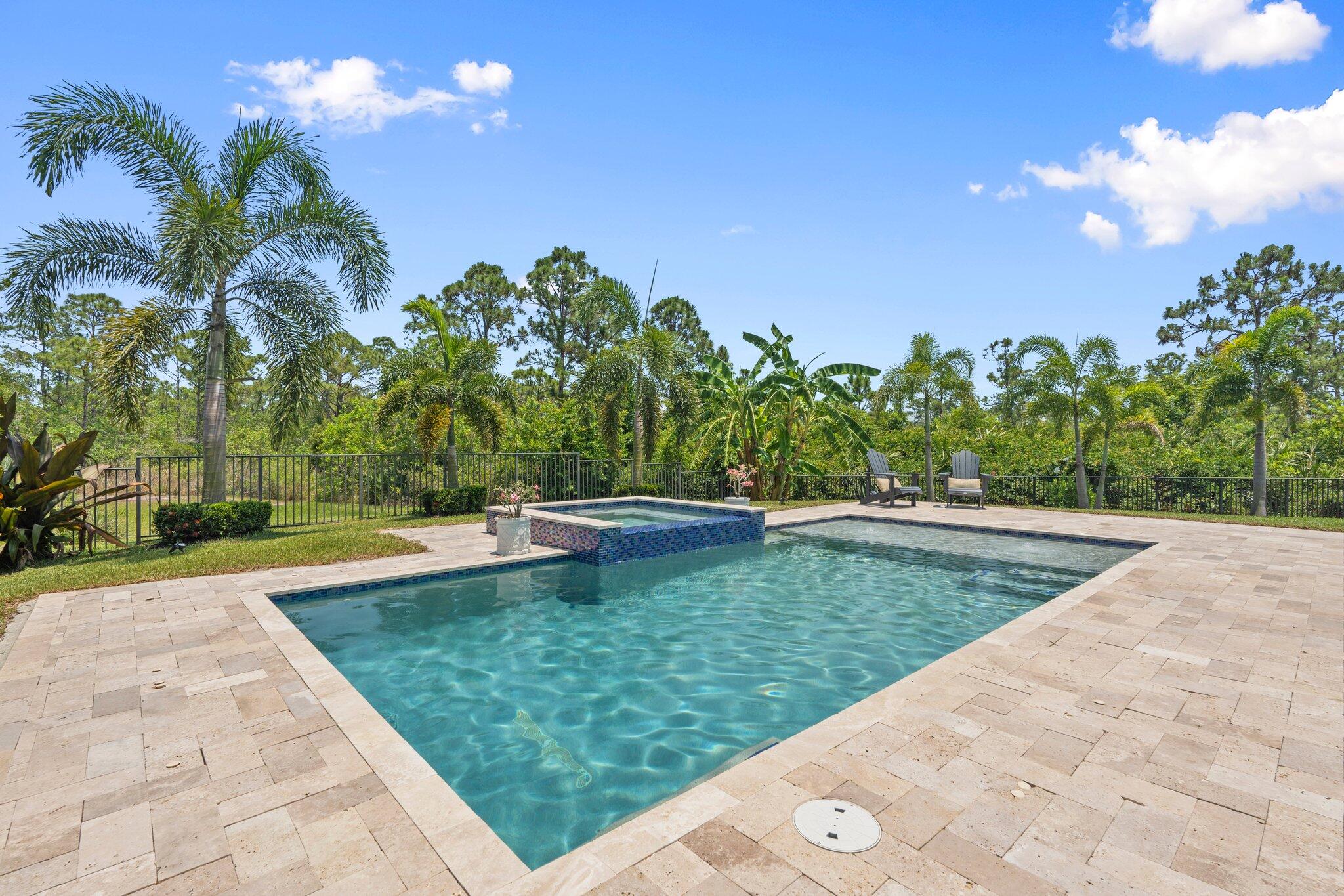 4701 Southwest Ardsley Drive Stuart, FL 34997 - Photo 49 of 83 a view of a backyard