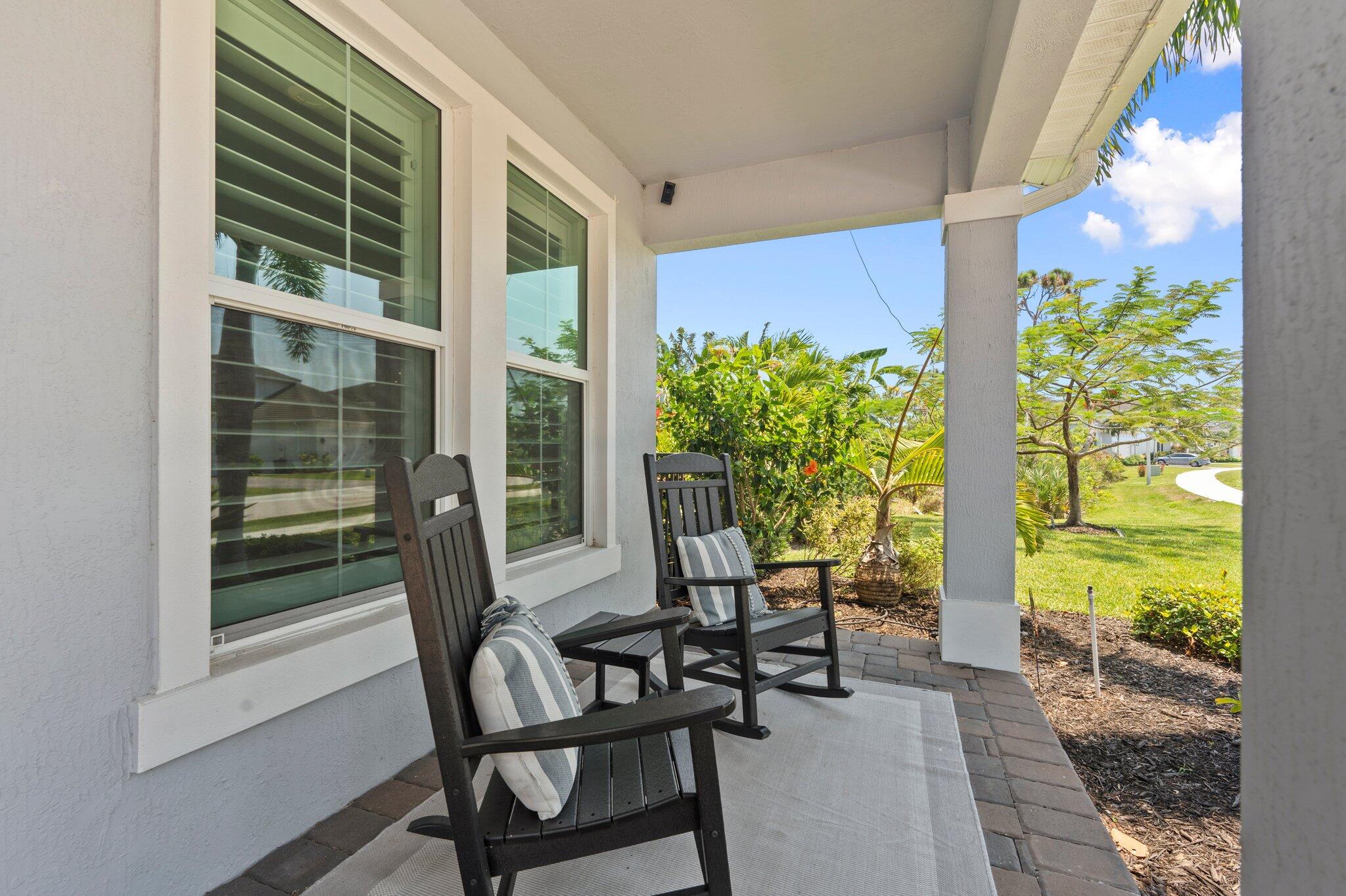 4701 Southwest Ardsley Drive Stuart, FL 34997 - Photo 5 of 83 a view of a dining room with furniture and a window