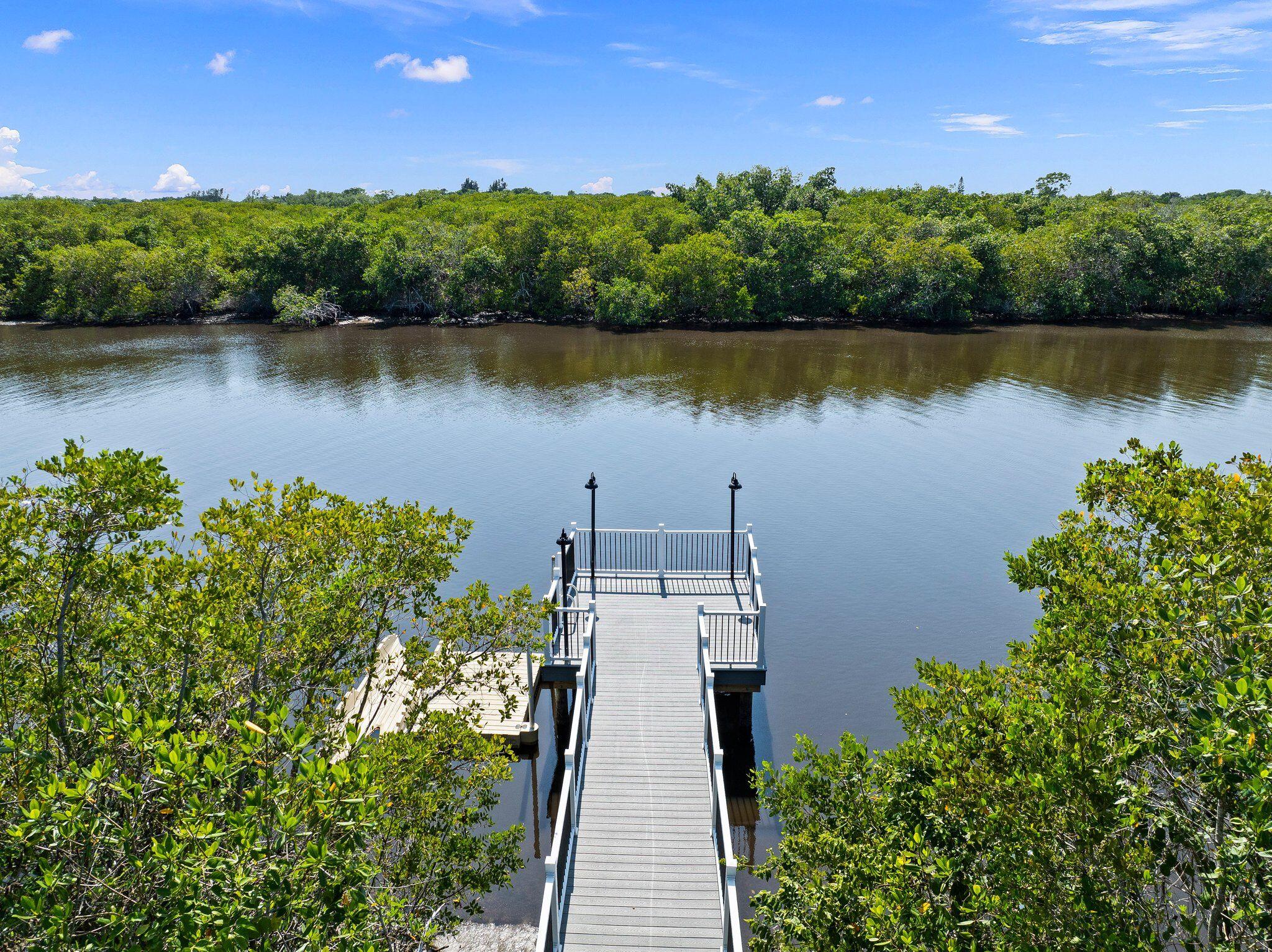 4701 Southwest Ardsley Drive Stuart, FL 34997 - Photo 71 of 83 a view of a lake with a outdoor space