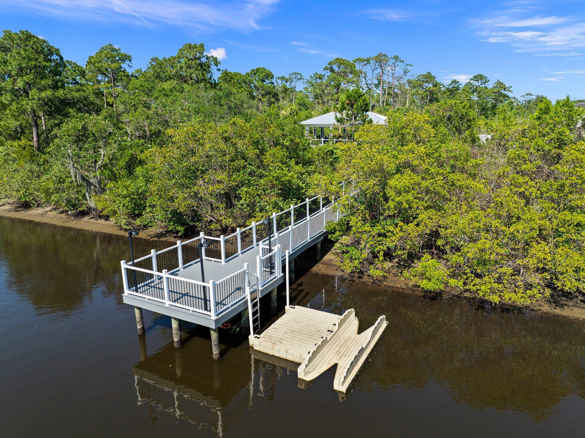 4701 Southwest Ardsley Drive Stuart, FL 34997 - Photo 72 of 83 a view of a balcony with chairs