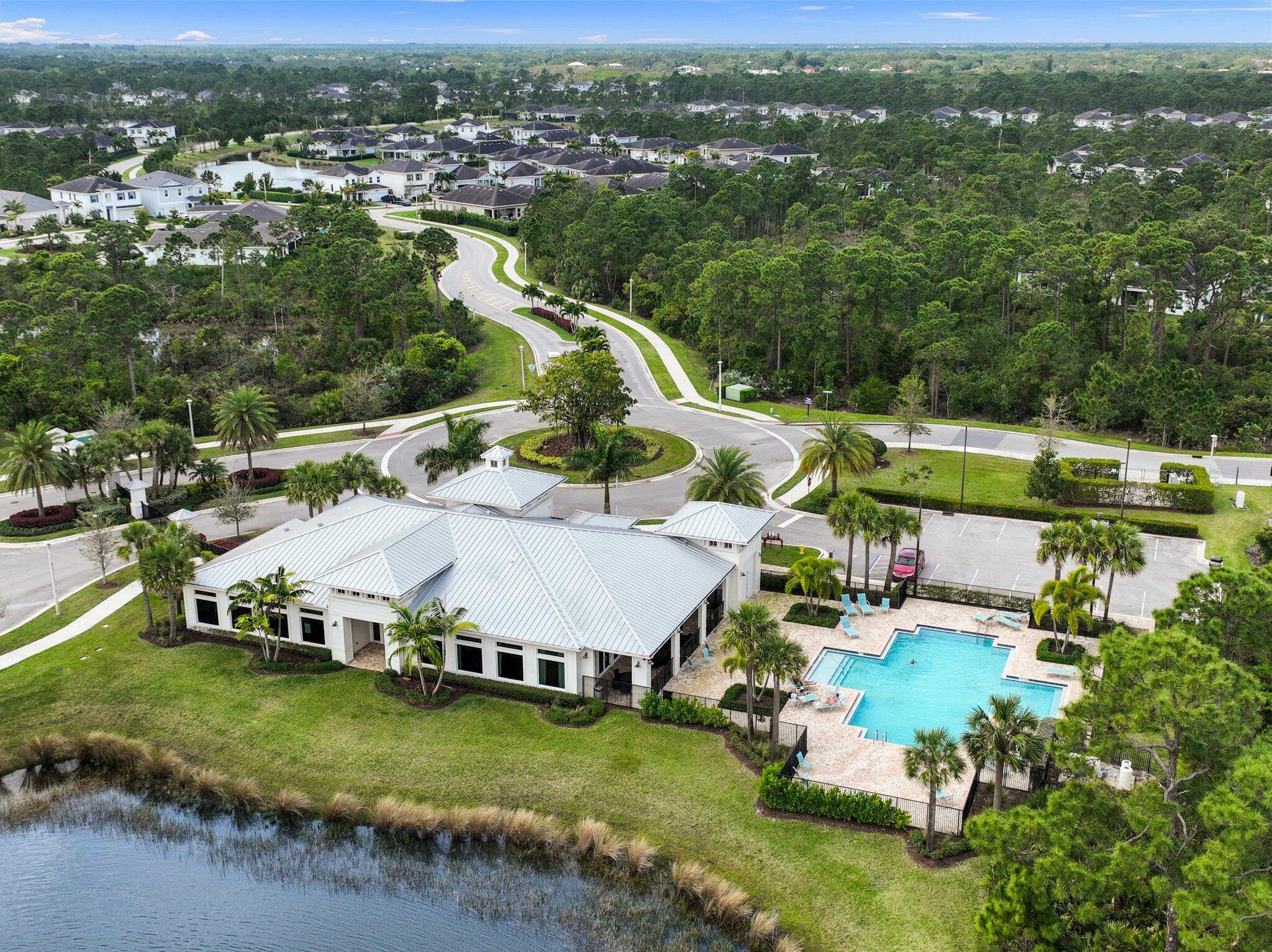 4701 Southwest Ardsley Drive Stuart, FL 34997 - Photo 73 of 83 an aerial view of a house with a garden and lake view