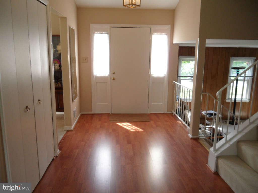 15200 Watergate Road Silver Spring, MD 20905 - Photo 7 of 22 a view of livingroom with furniture and wooden floor
