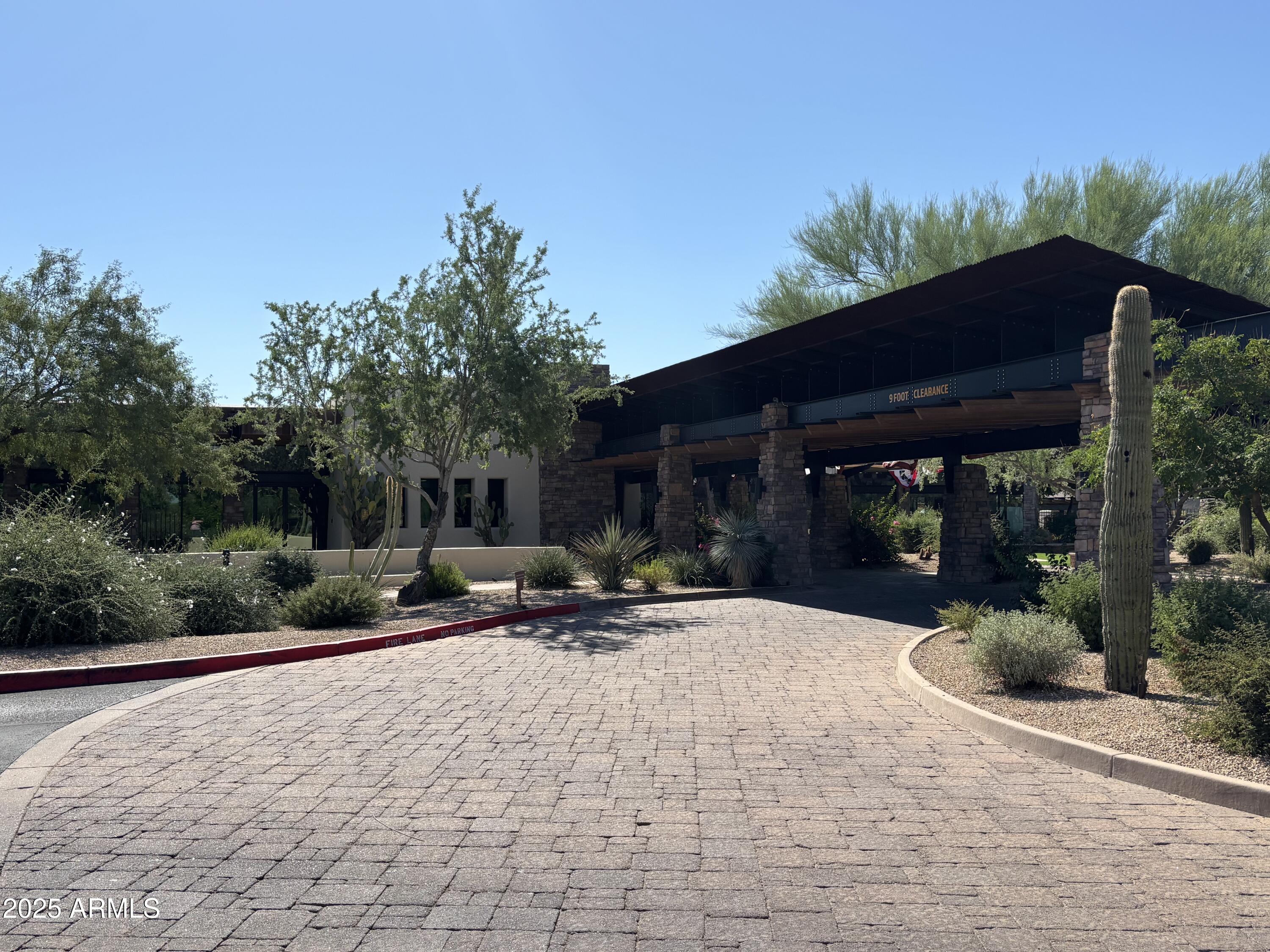3935 East Rough Rider Road, Unit 1014 Phoenix, AZ 85050 - Photo 26 of 40 a view of outdoor space yard and patio