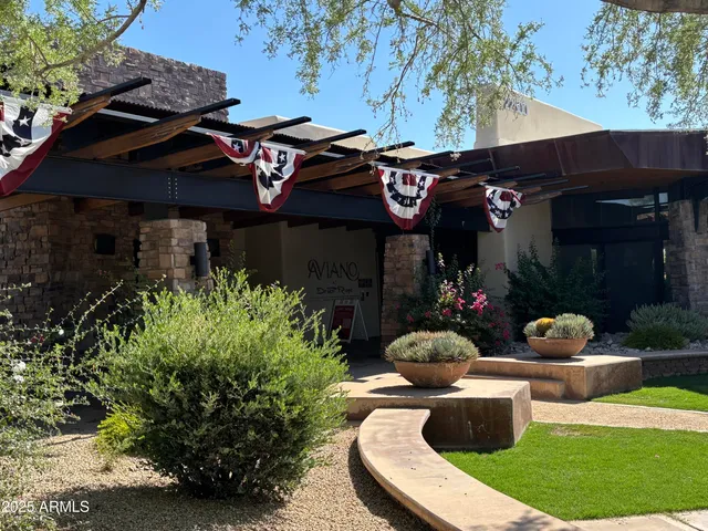a view of a cafe with sitting area