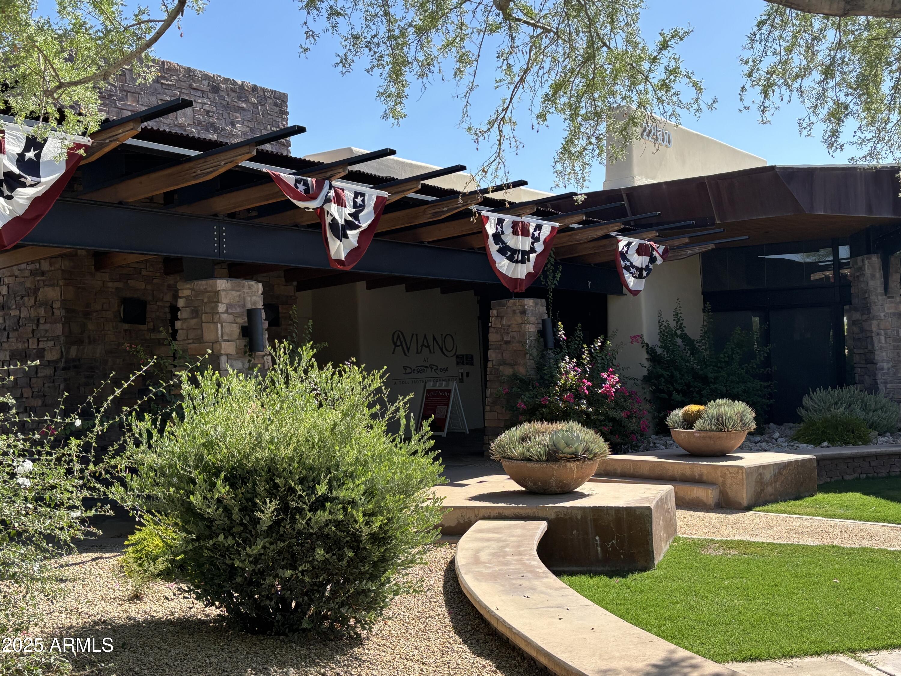 3935 East Rough Rider Road, Unit 1014 Phoenix, AZ 85050 - Photo 28 of 40 a view of a cafe with sitting area