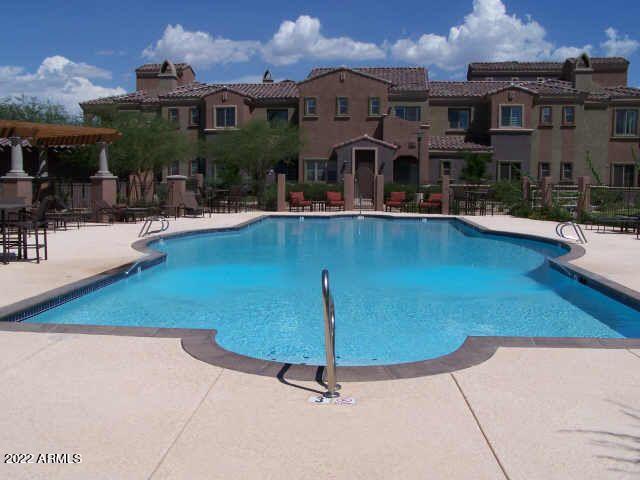 3935 East Rough Rider Road, Unit 1014 Phoenix, AZ 85050 - Photo 33 of 40 an aerial view of a house
