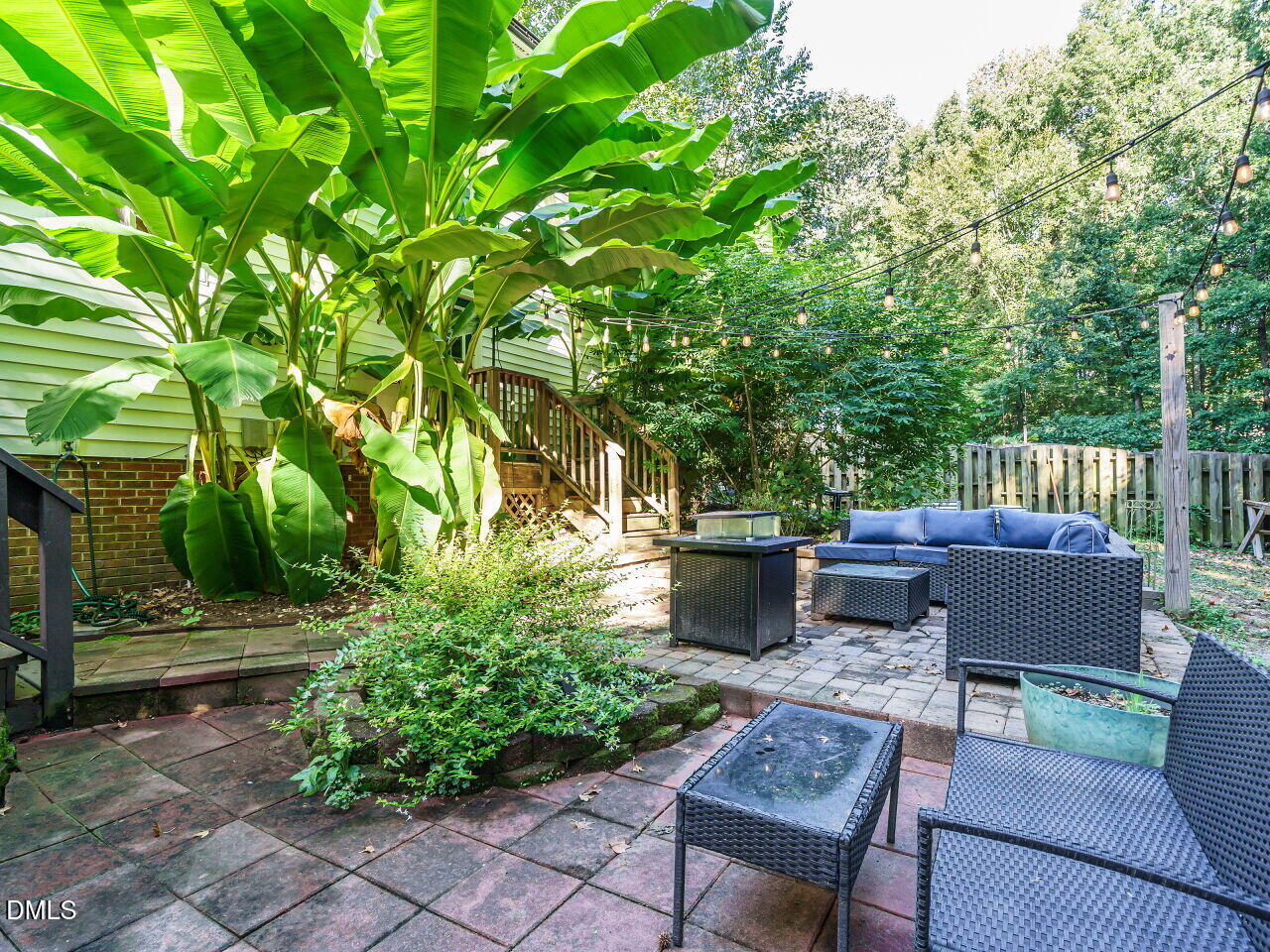 4104 Betterton Drive Raleigh, NC 27613 - Photo 26 of 32 a view of a patio with a chairs in a patio