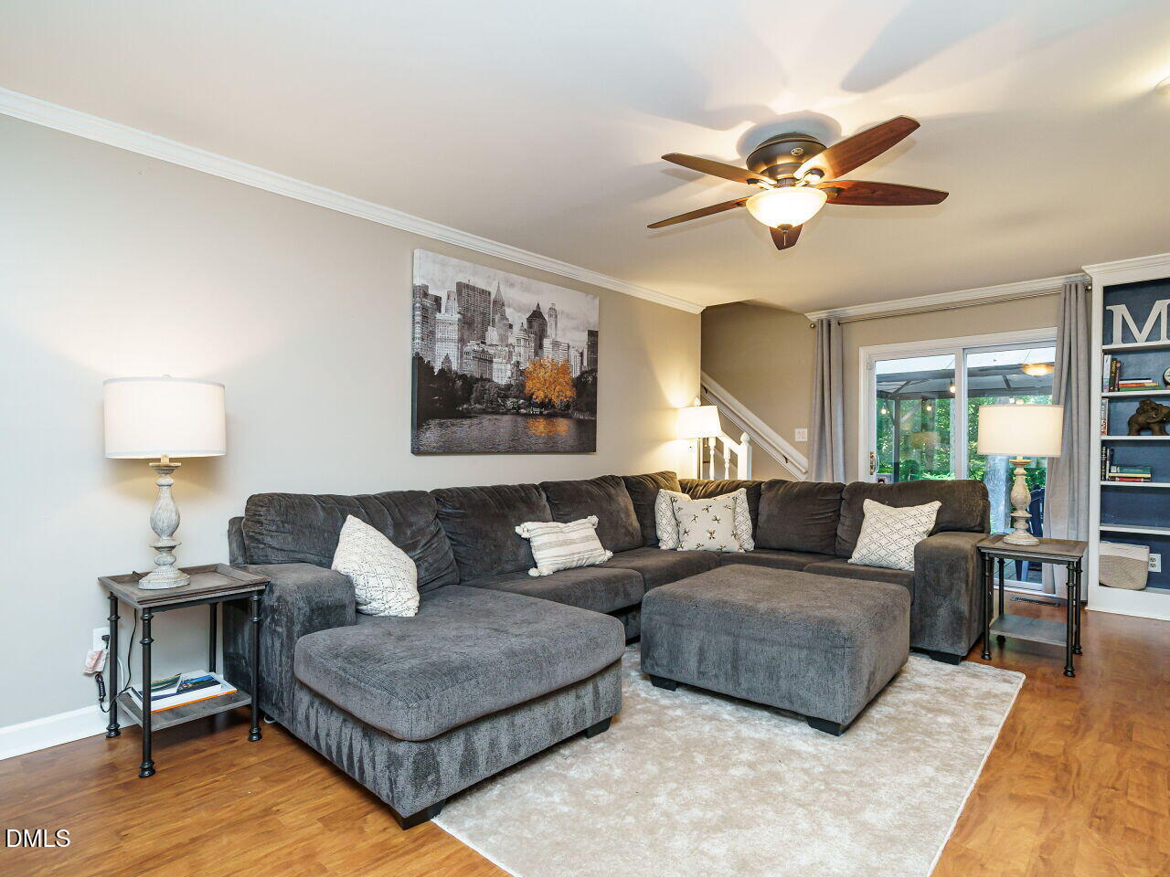 4104 Betterton Drive Raleigh, NC 27613 - Photo 4 of 32 a living room with furniture and a wooden floor