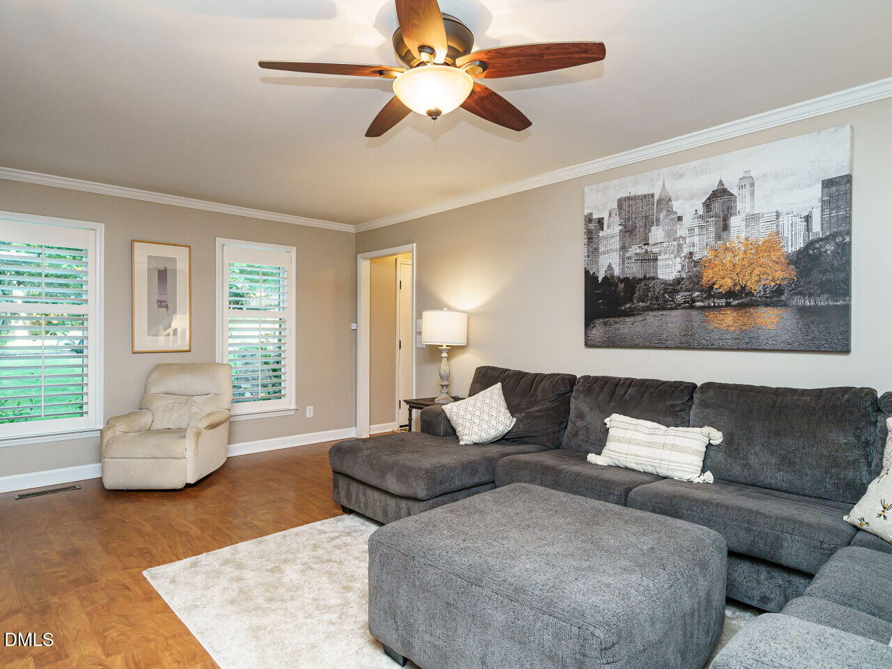 4104 Betterton Drive Raleigh, NC 27613 - Photo 5 of 32 a living room with furniture and a large window