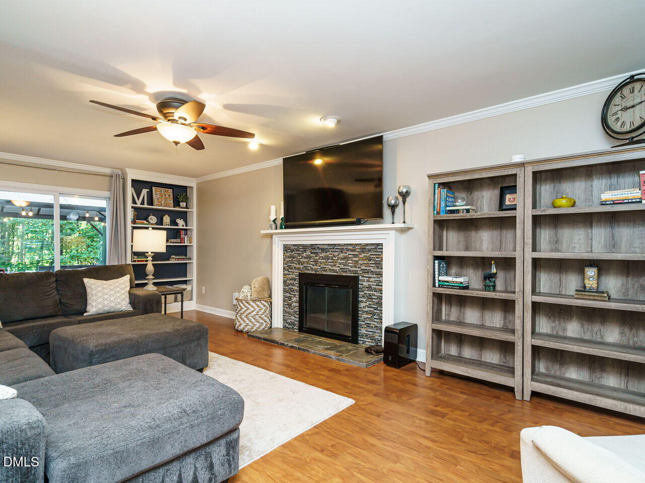 4104 Betterton Drive Raleigh, NC 27613 - Photo 7 of 32 a living room with furniture and a fireplace