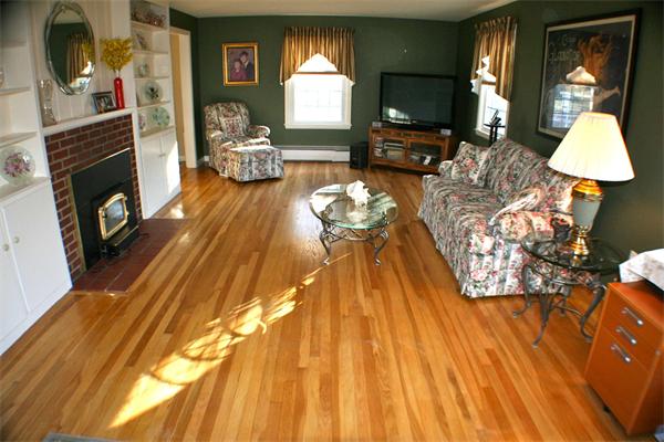 170 Anawan Road North Attleboro, MA 02760 - Photo 11 of 26 a living room with furniture and a fireplace