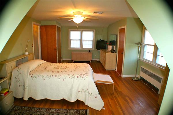 170 Anawan Road North Attleboro, MA 02760 - Photo 16 of 26 a spacious bedroom with a bed dresser and a window