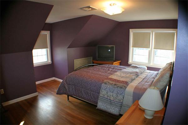170 Anawan Road North Attleboro, MA 02760 - Photo 17 of 26 a bedroom with a bed and lamp with window