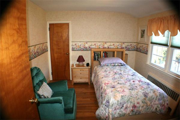 170 Anawan Road North Attleboro, MA 02760 - Photo 19 of 26 a living room with furniture and a fireplace