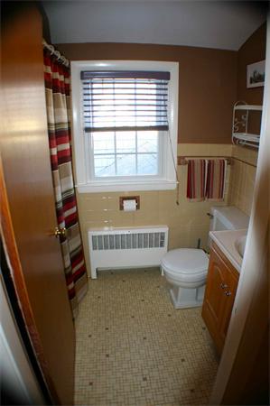 170 Anawan Road North Attleboro, MA 02760 - Photo 21 of 26 a bathroom with a toilet a sink and a window