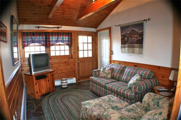 170 Anawan Road North Attleboro, MA 02760 - Photo 23 of 26 a living room with furniture a flat screen tv and a window