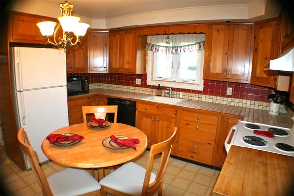 170 Anawan Road North Attleboro, MA 02760 - Photo 8 of 26 a dining room with a sink chairs and chandelier