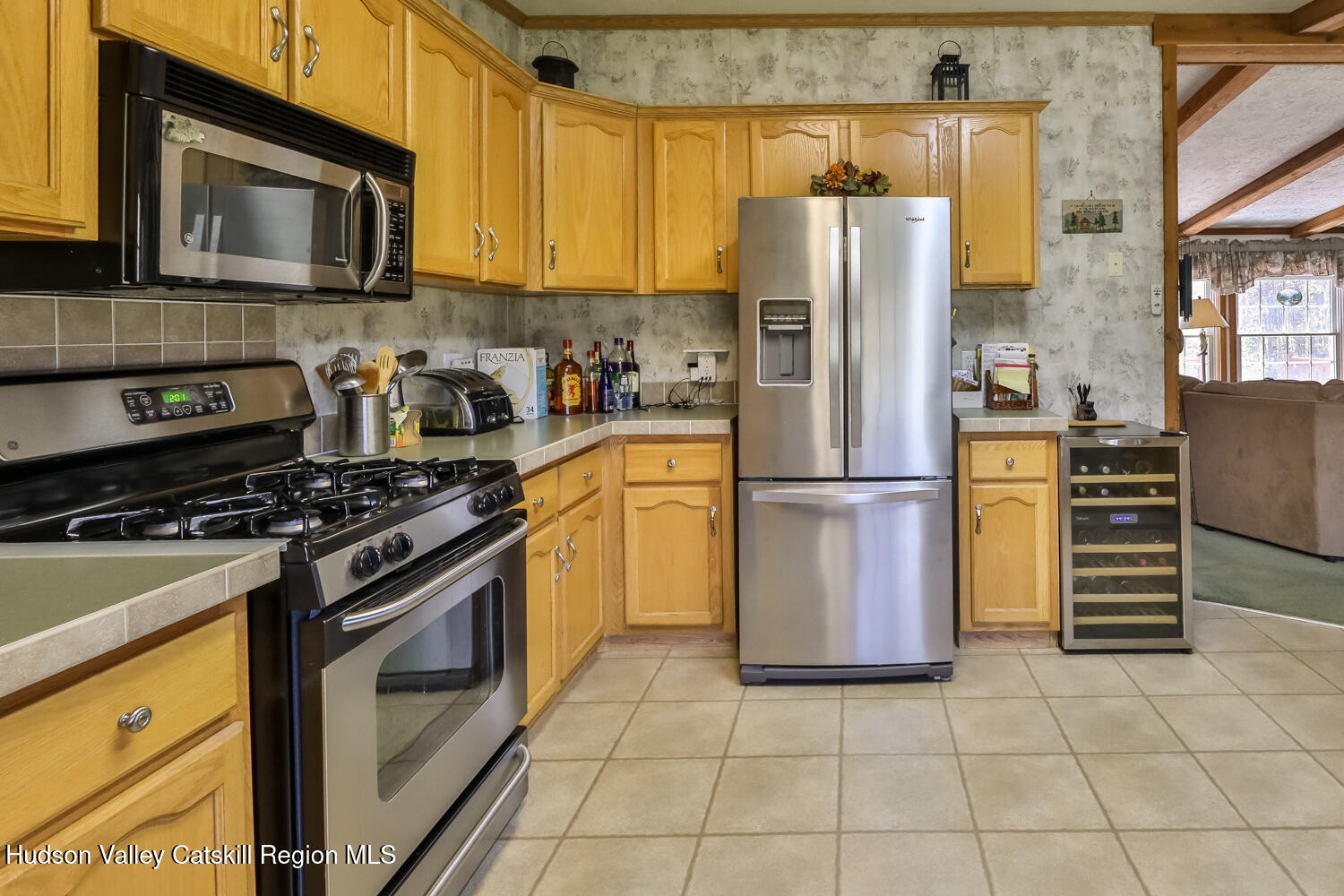 751 Mitchell Hollow Road Windham, NY 12496 - Photo 13 of 37 a kitchen with stainless steel appliances granite countertop a refrigerator stove and microwave
