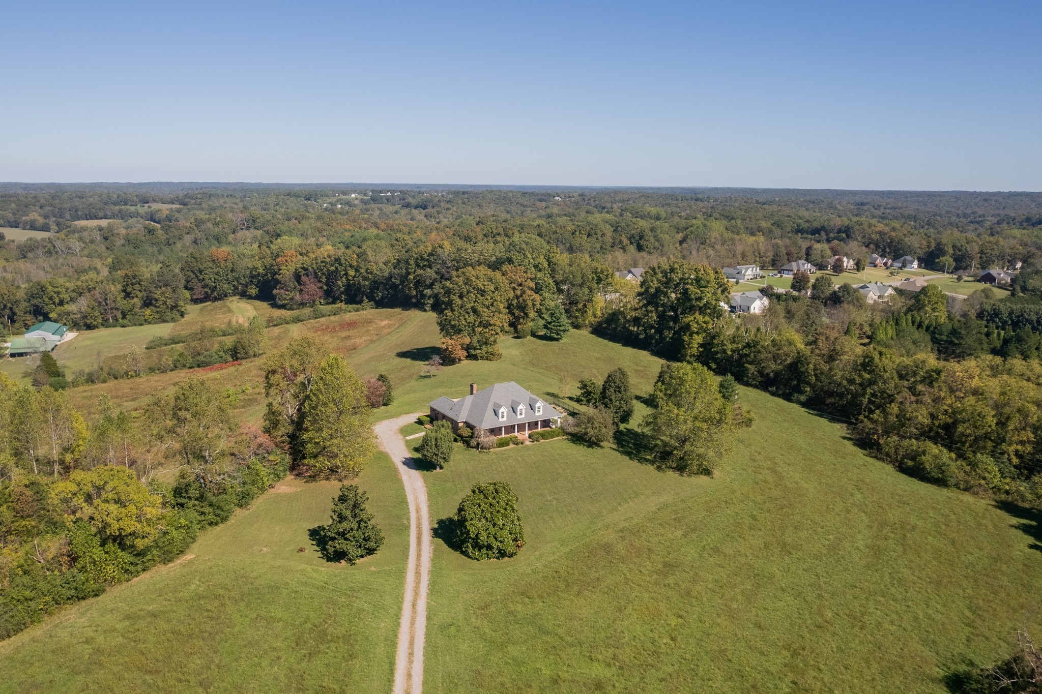 an aerial view of residential house with outdoor space