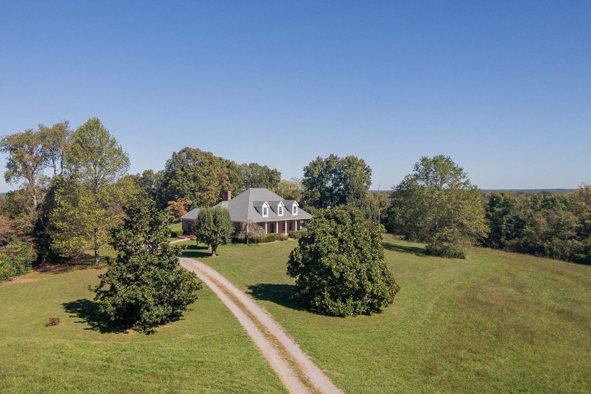 314 Fairview Road Dickson, TN 37055 - Photo 19 of 35 a view of a yard with table and chairs
