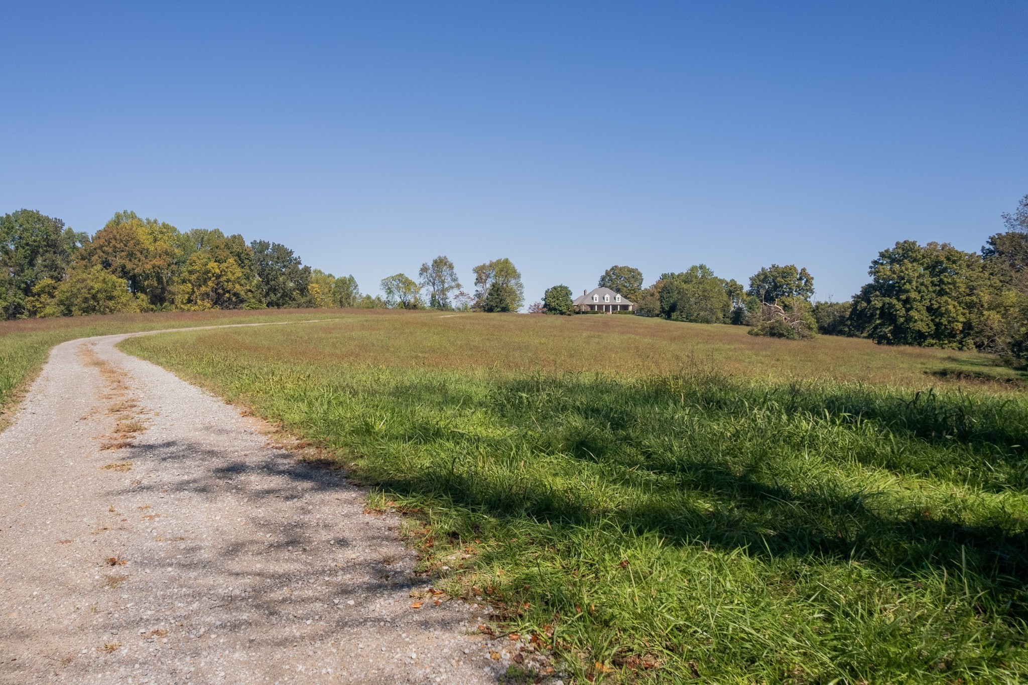 314 Fairview Road Dickson, TN 37055 - Photo 35 of 35 a view of a lake with beach and mountain in the back