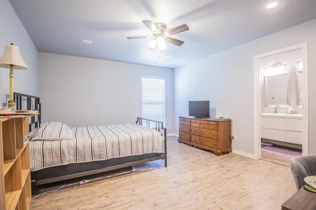 a kids bedroom with a bed and toys