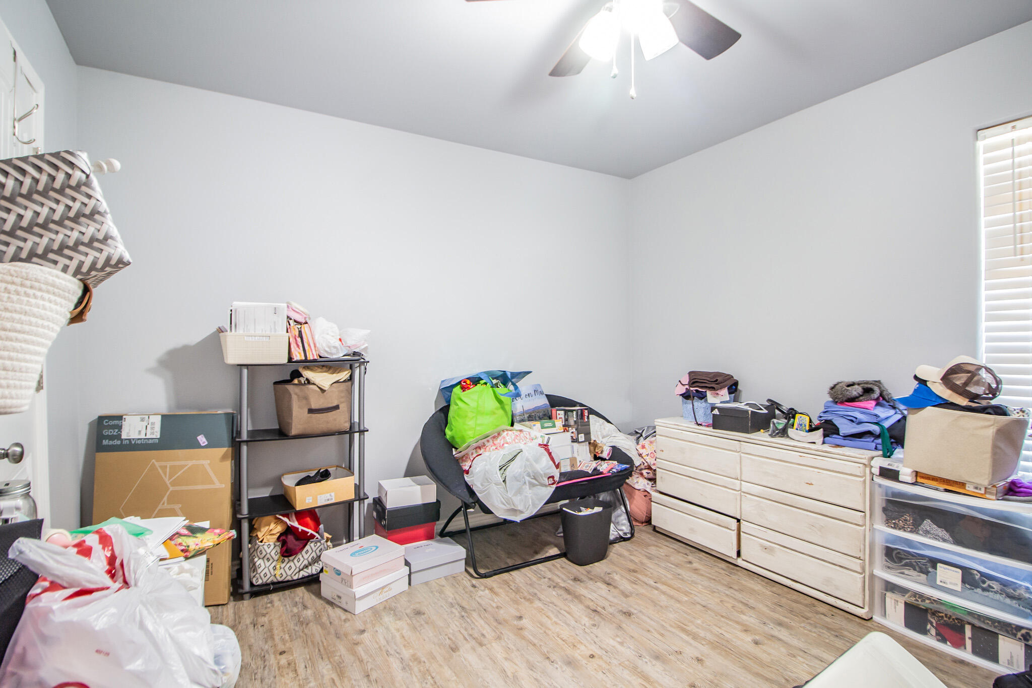 8812 15th Street Lubbock, TX 79416 - Photo 12 of 16 a kids bedroom with a bed and toys