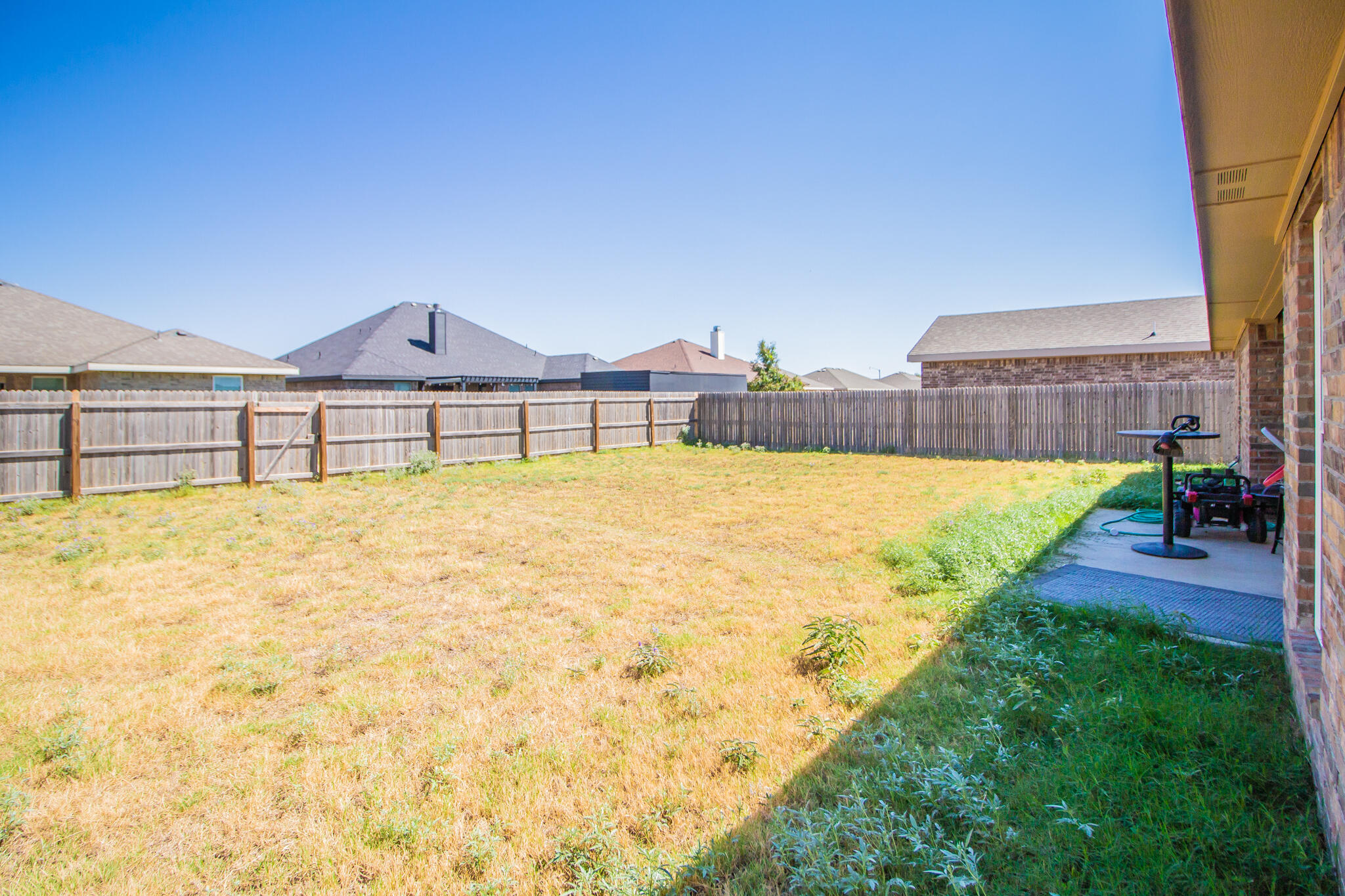 8812 15th Street Lubbock, TX 79416 - Photo 13 of 16 a view of a swimming pool with lounge chairs