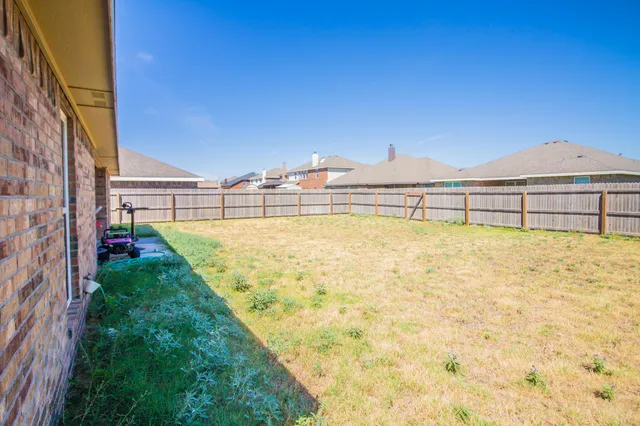 a very nice looking dining room with a large window
