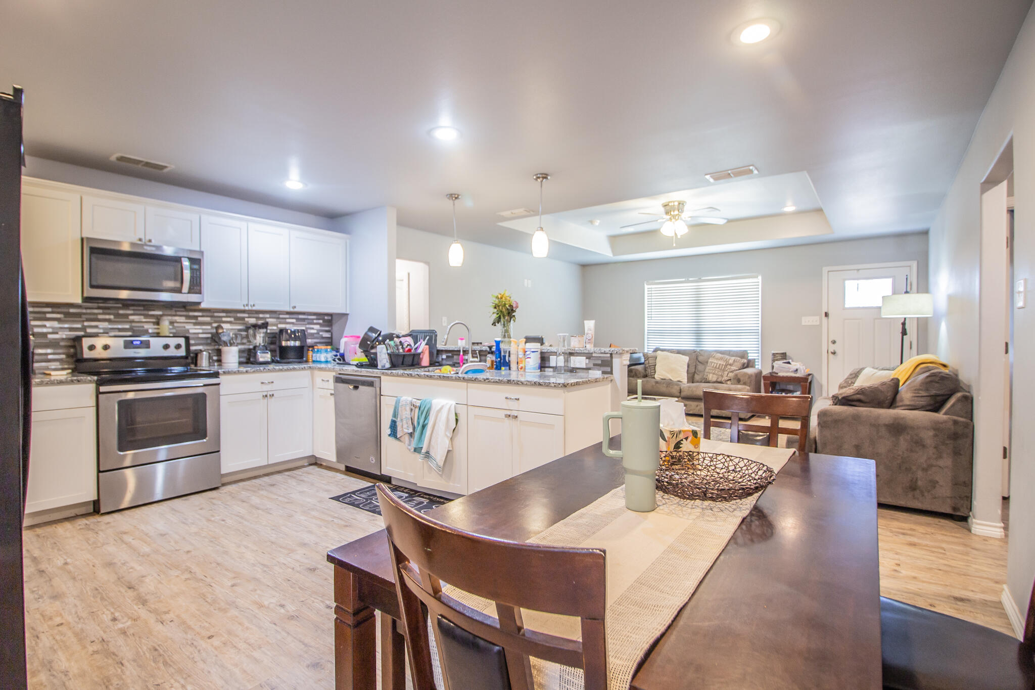 8812 15th Street Lubbock, TX 79416 - Photo 5 of 16 a view of kitchen with cabinets and counter space