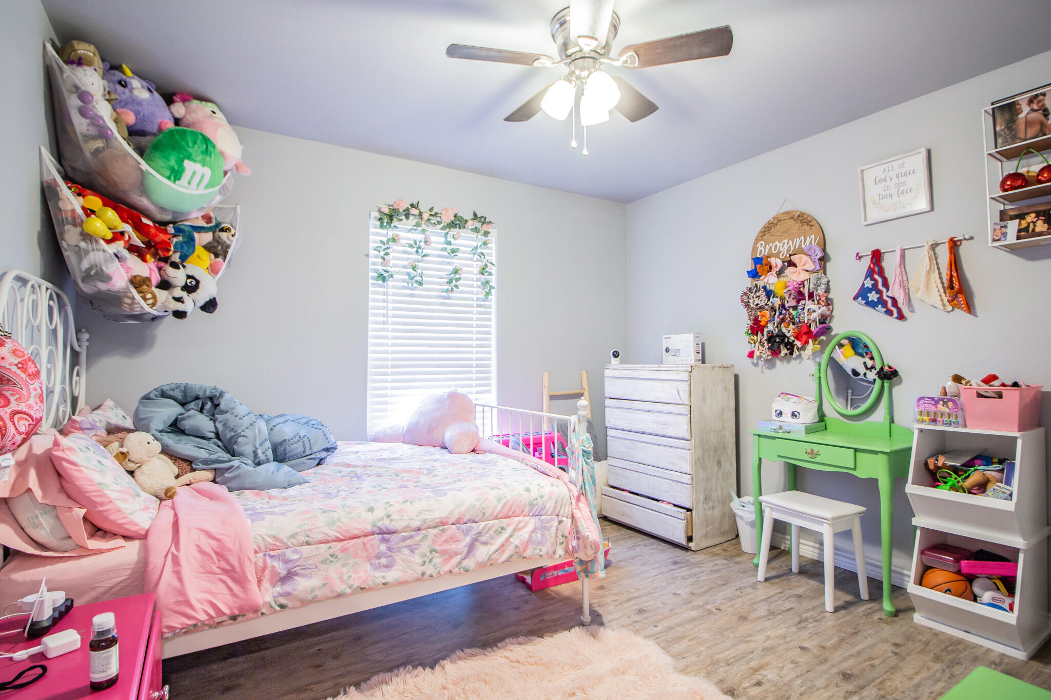 8812 15th Street Lubbock, TX 79416 - Photo 9 of 16 a bedroom with a bed and a window