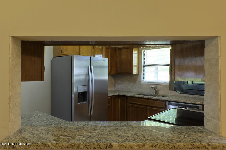 2397 Range Line Road Middleburg, FL 32068 - Photo 13 of 45 View of Kitchen though Pass Through