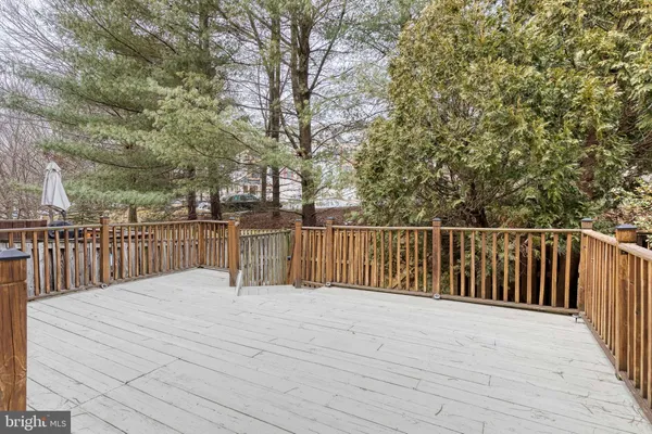a view of backyard and deck