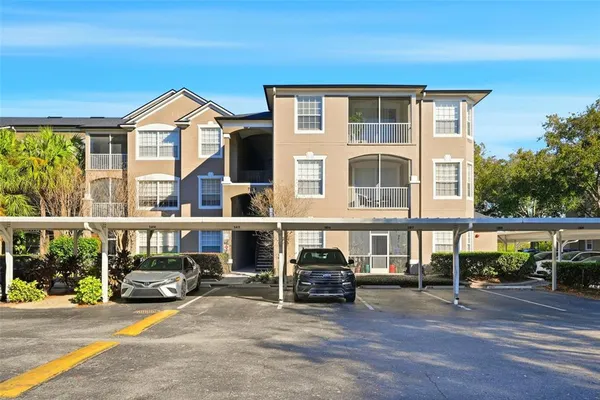 a view of a car park in front of house