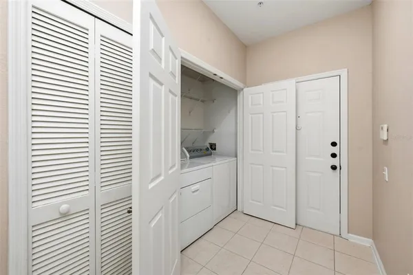 a view of a room with a large window