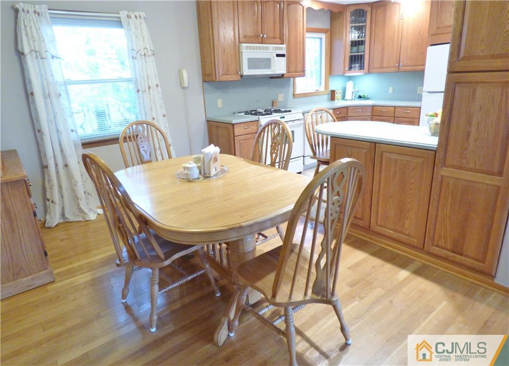 7 Laythan Road Edison, NJ 08817 - Photo 3 of 19 a view of a dining room with furniture and a window