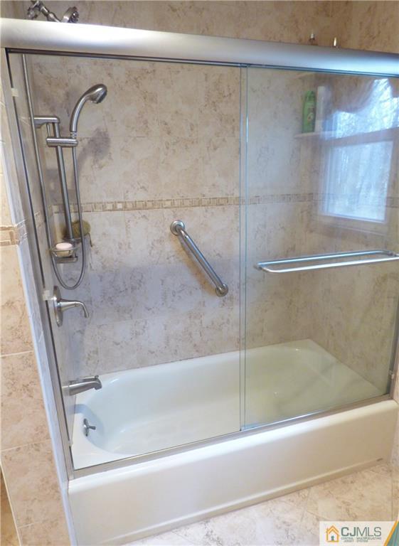 7 Laythan Road Edison, NJ 08817 - Photo 8 of 19 a close view of a bathtub in bathroom