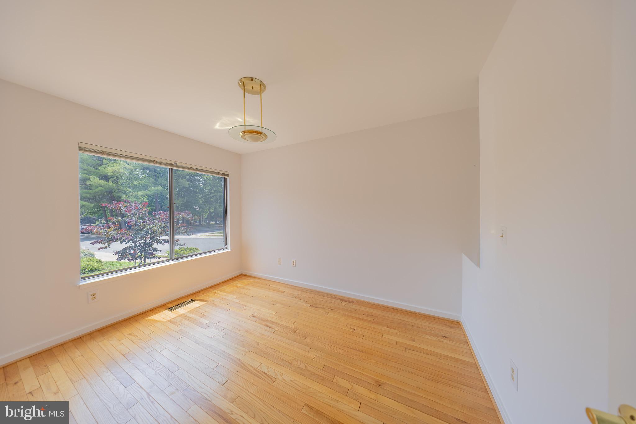 2201 Cedar Cove Court Reston, VA 20191 - Photo 2 of 25 Bright office with a large sunny window.