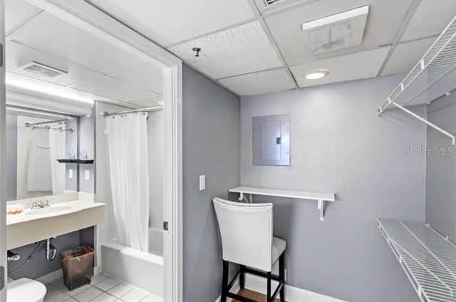 a view of a bathroom with dual sinks